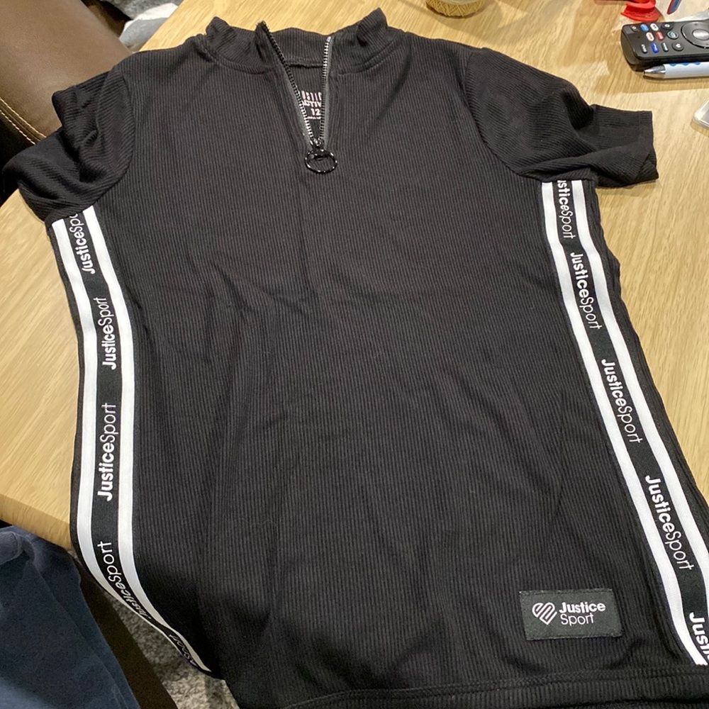 Justice sport girls top. Black with zipper. Size 12